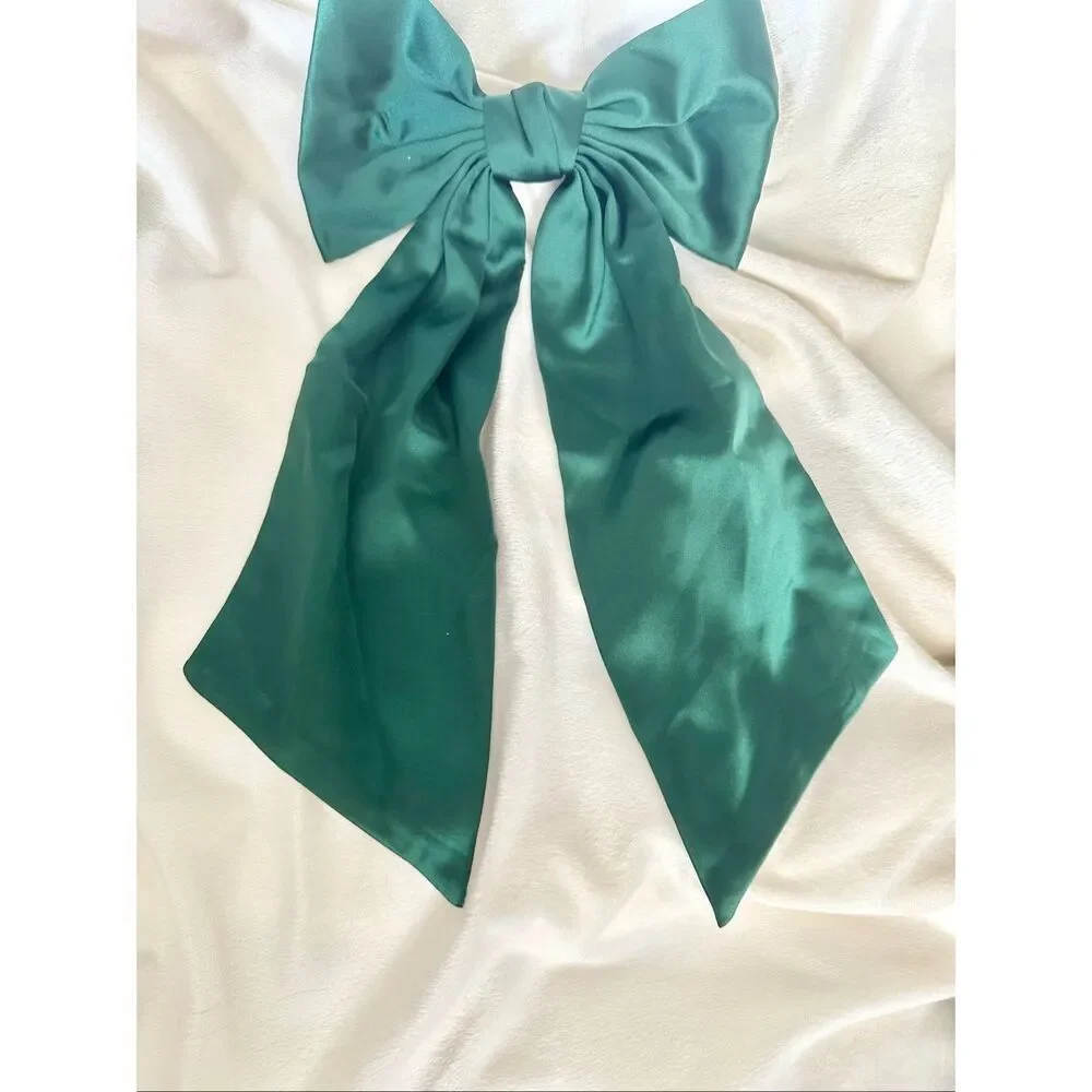 Elegant green satin holiday bow - with Barrett clip close - great for thick hair